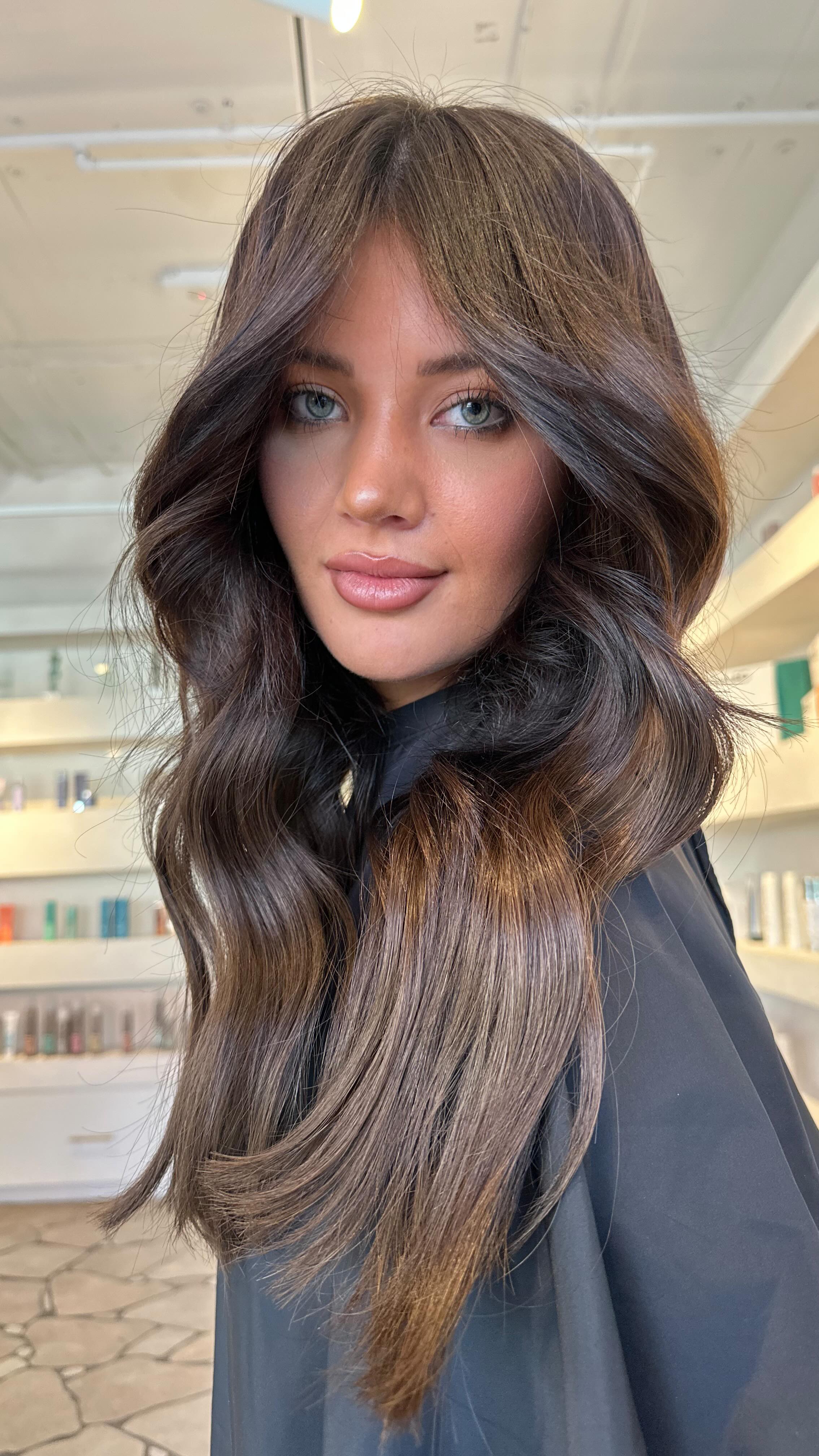 Instagram post by @alarah_studio for Wella Professionals Chile. Caption reads: HANNAH GOES BROWN - LONGER & HEALTHIER ! What a....