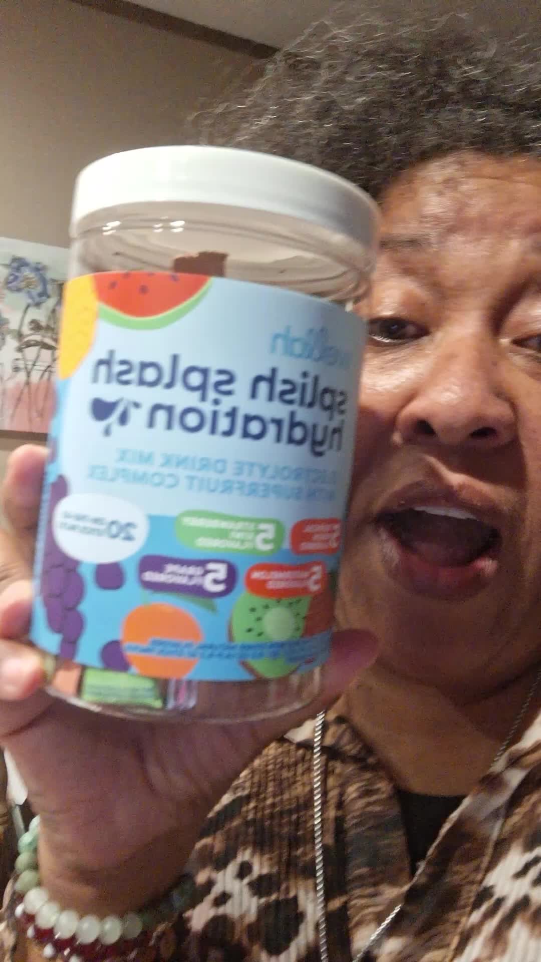 TikTok post by @lowandadavis2 for Wellah Nutrition. Caption reads: @Wellah Nutrition splish splash hydration....