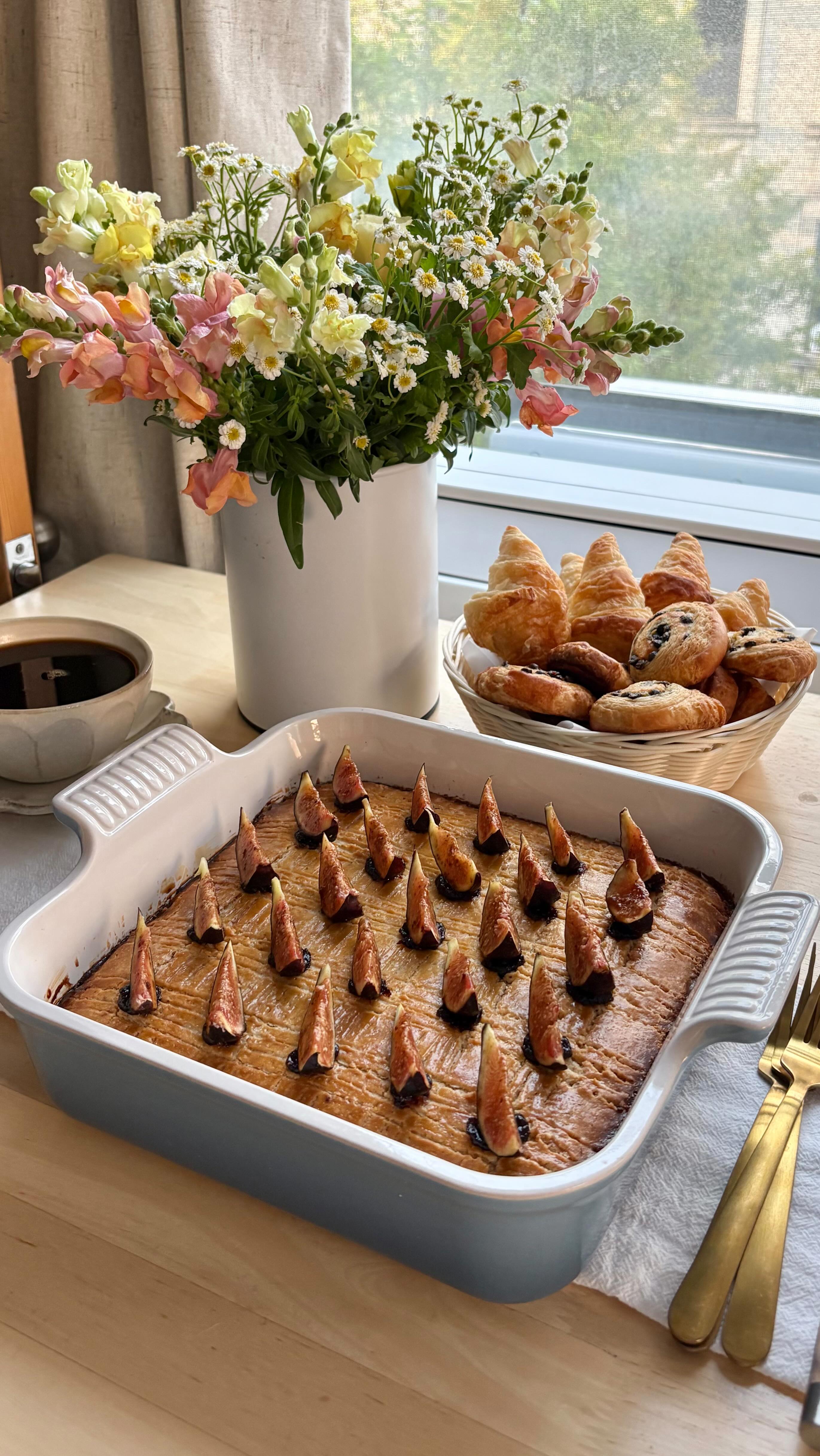 Instagram post by @danabydana for Le Creuset. Caption reads: turning my nyc apartment into a French bakery....