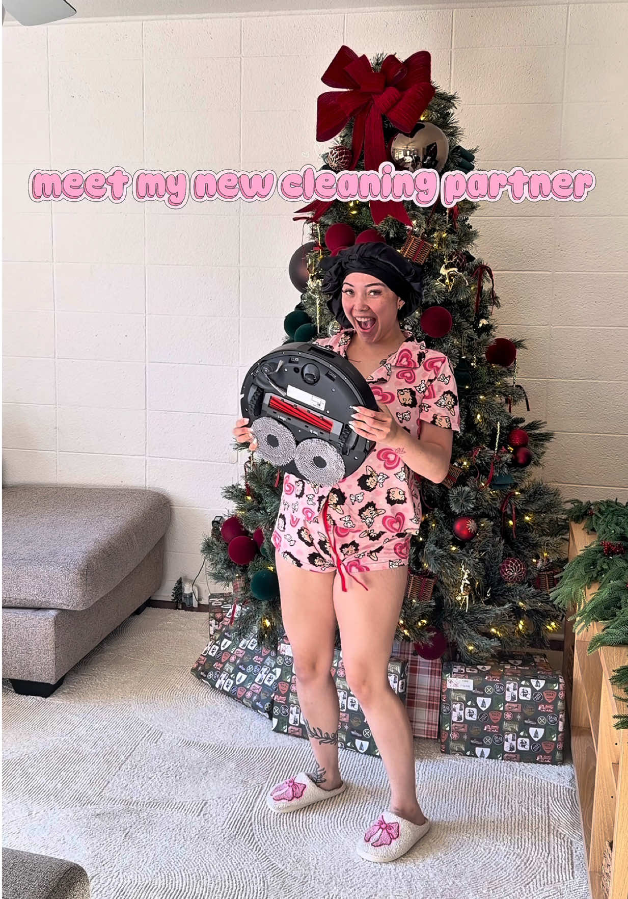 TikTok post by @miafaithe for Roborock. Caption reads: My new bestie 🤪😍Check the @RoborockUS QV35S in....