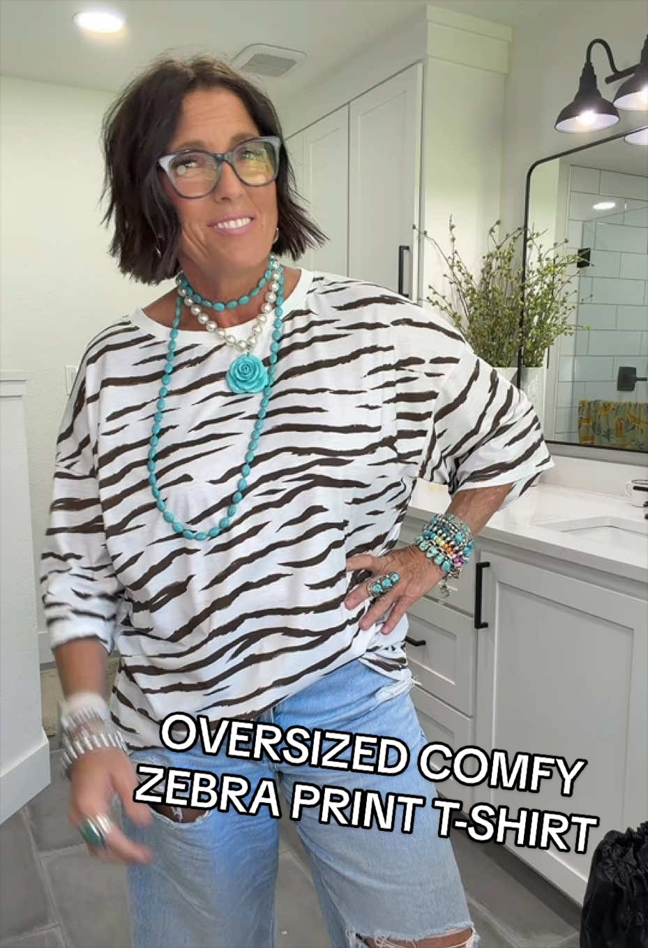 TikTok post by an influencer for Imily Bela Living. Caption reads: [...] #oversizedshirt #outfit @Imily Bela Living.