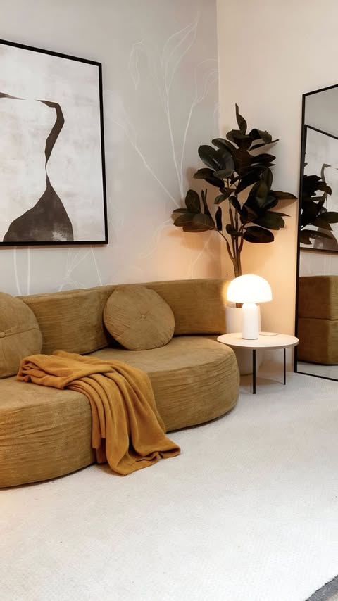 Instagram post by @athomewithsidi for Temu. Caption reads: Who knew a sofa could be this clever? 😍 This....