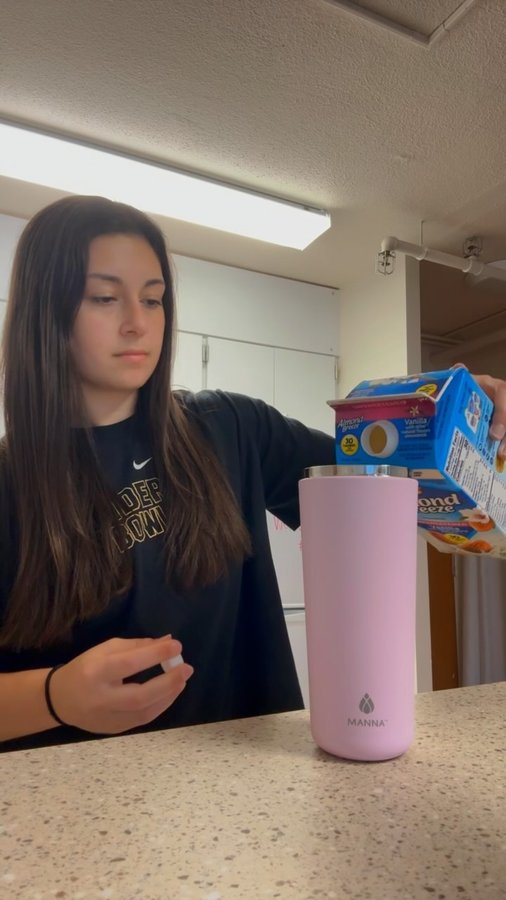 Instagram post by @victoria.varano for Manna Hydration. Caption reads: [...] ☕️ keeping my iced coffee cold with....