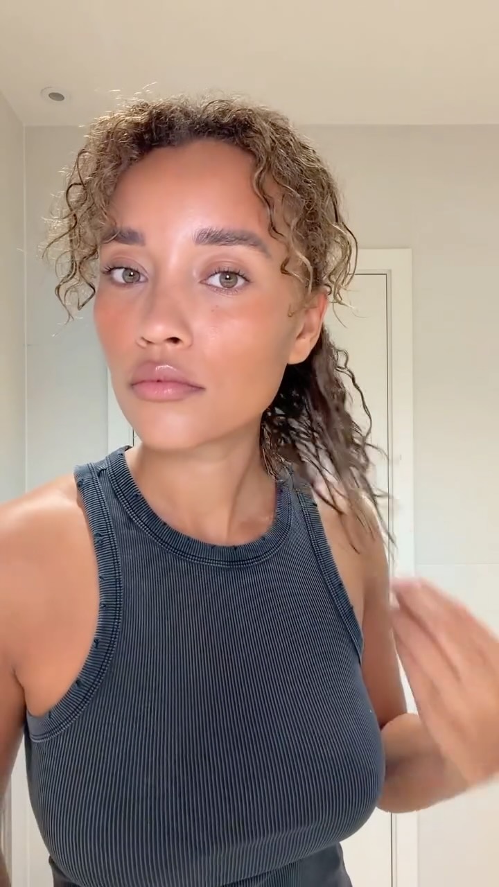 Instagram post by @officialellesmith for K18 Hair. Caption reads: the one consistent thing in my hair care routine....