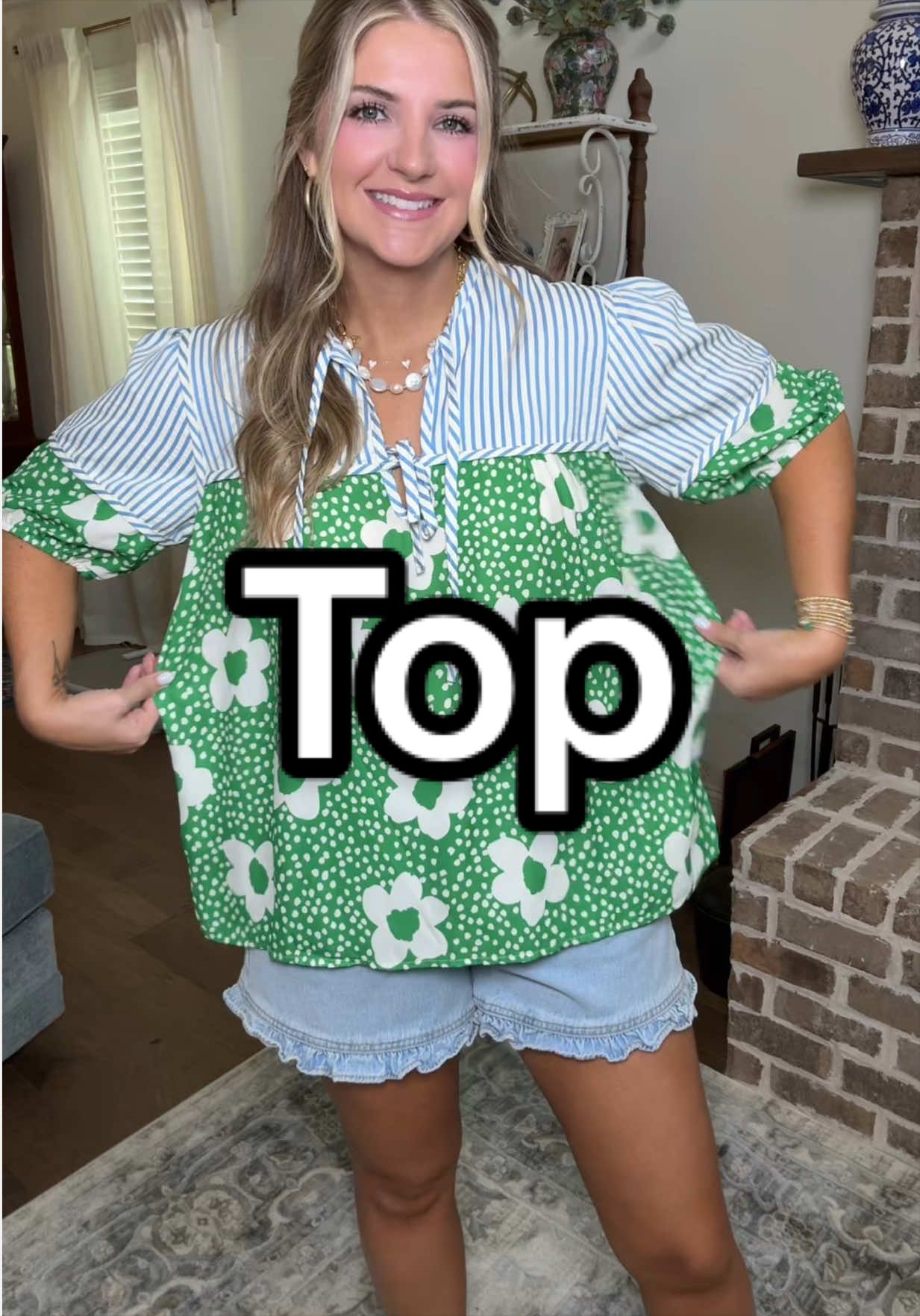 TikTok post by @caleighdeal for SageVell. Caption reads: Cute and flowy top! #summeroutfits #SummerVibes....
