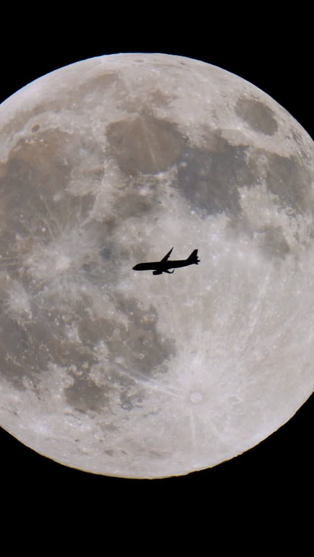 Instagram post by @rami_astro for Spirit Airlines. Caption reads: 4k video of a plane transit in front of the Moon....