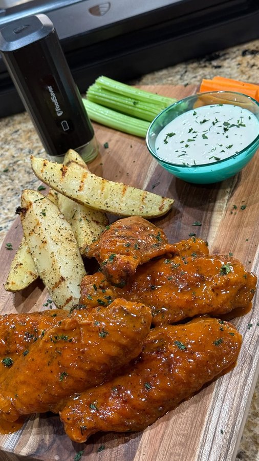 Instagram post by @bamagrillmaster for FoodSaver. Caption reads: [...] Buffalo Turkey Wings using the New....