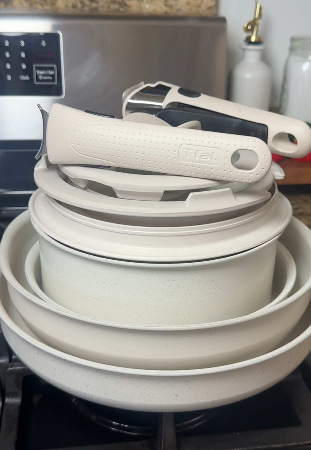 TikTok post by @marlen.cooks for T-fal USA. Caption reads: [...] dishwasher safe! It’s also Stackable! @T-fal....