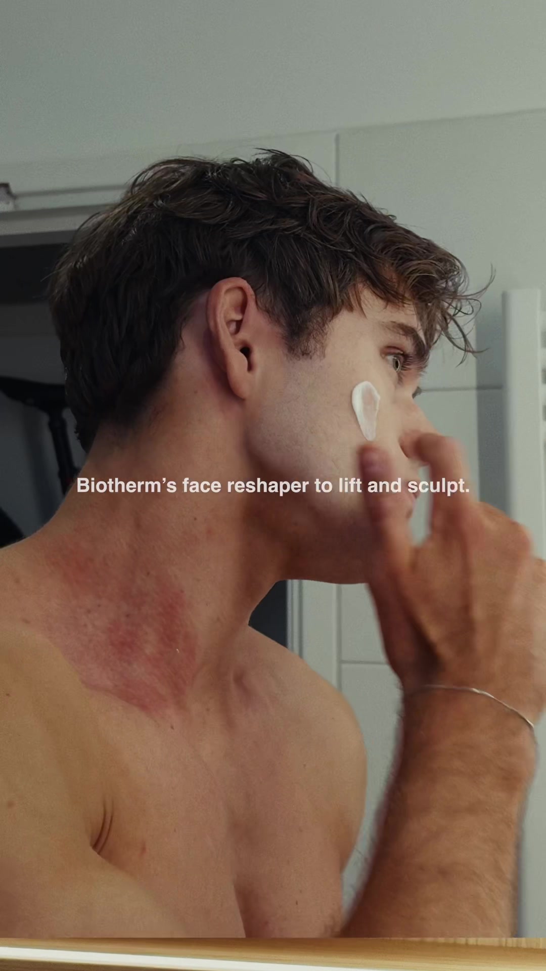 TikTok post by @daan_schel for BIOTHERM. Caption reads: a day in the life🎧💆🏻‍♂️ ad work, training and....