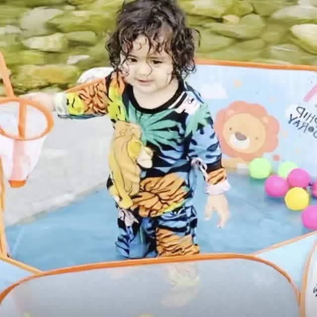 Instagram post by @veer_chaudhary2024 for Babyhug. Caption reads: Splish splash, giggles in a flash!💦
Babyhug’s....