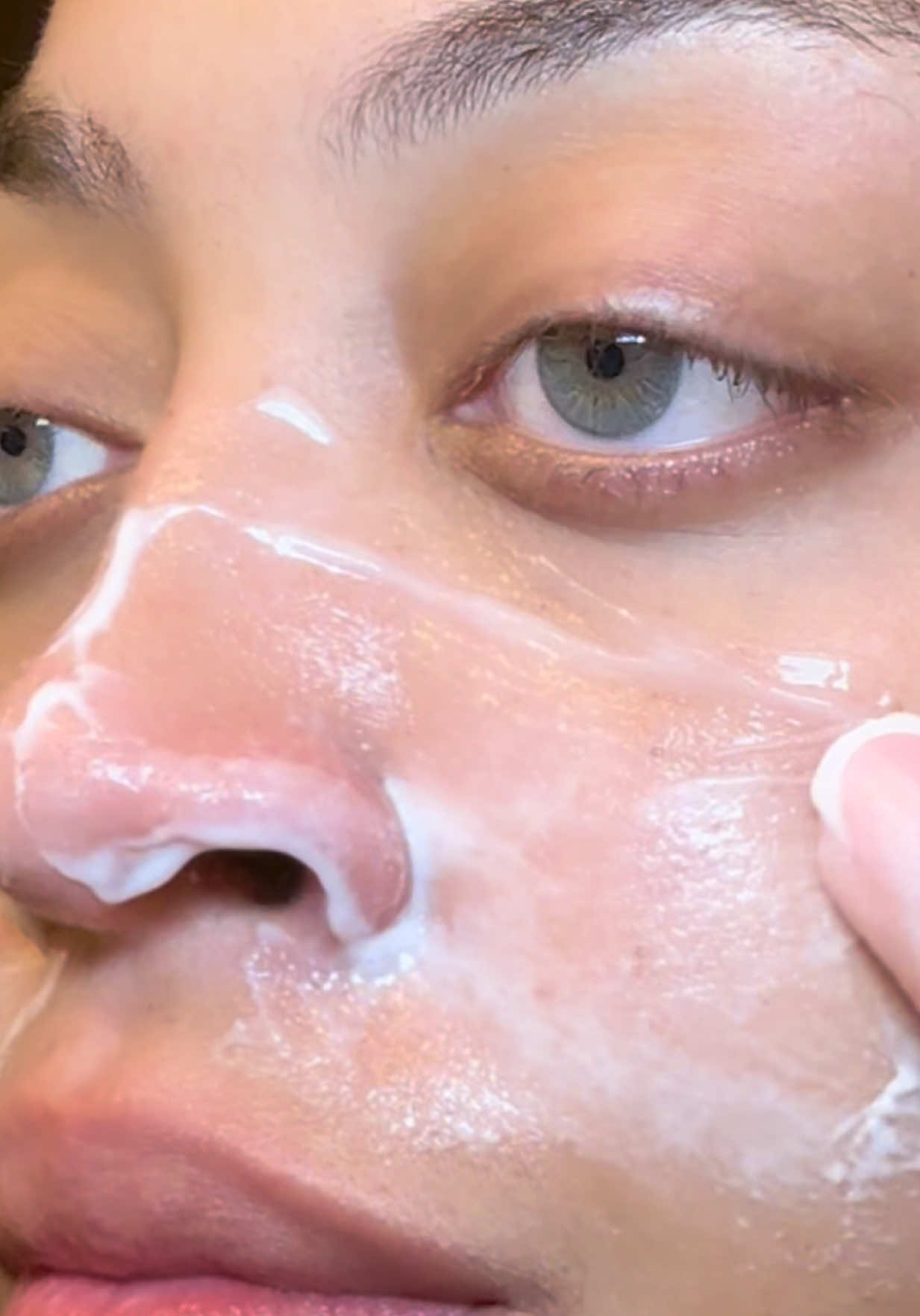 TikTok post by @madechinajay for OLAY. Caption reads: Let’s Clean my pores with @Olay Skin Care 🤍✨ ad....