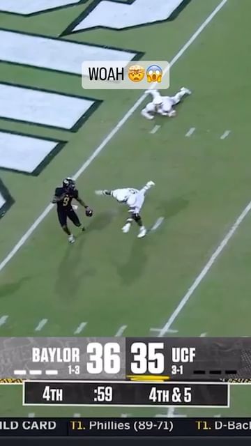 Instagram post by @ucf.football for Old Trapper Beef Jerky. Caption reads: McClain is INSANE 😤 

(Sponsored by @old_trapper....