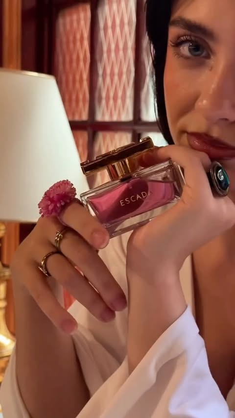 Instagram post by @patri_vicente_ for Escada Fragrances. Caption reads: [...] underneath. Especially @escadafragrances 🤍....
