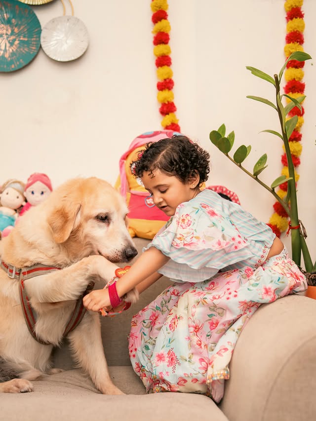 Instagram post by @_bhumika_rajguru_das for Babyhug. Caption reads: [...] in this cute festive outfit from @babyhug,....