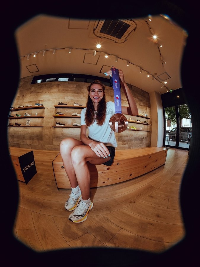 Instagram post by @juliapaternain_ for Saucony. Caption reads: World Championship Marathon bronze medalist....