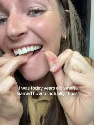 TikTok post by @healthcoach_ash for biöm. Caption reads: Throw away your waxy plastic floss you gotta try....
