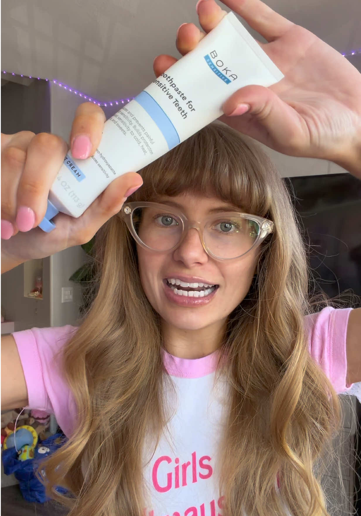 TikTok post by @demlia for Boka. Caption reads: [...] is the coolest toothpaste! use my code....