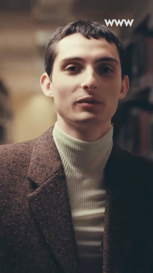 Instagram post by @finnwolfhardofficial for Who What Wear. Caption reads: What was the strangest thing that happened while....