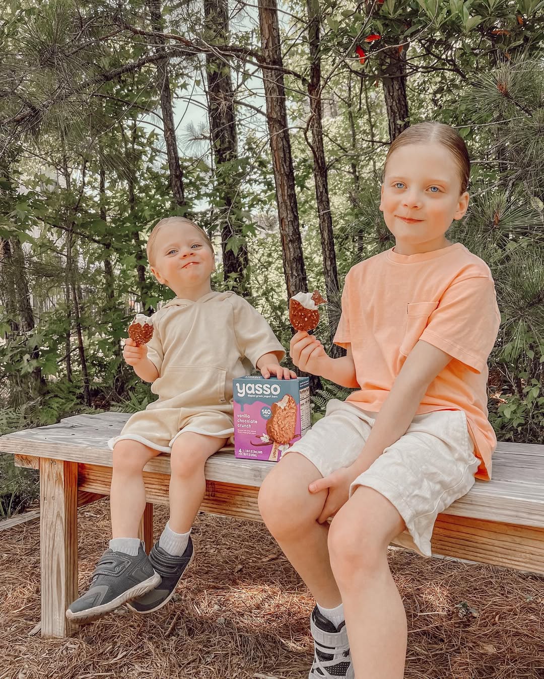 Instagram post by @mombunsandcaffeine for Yasso. Caption reads: Nothing better than @yasso on a hot day! #ad My....