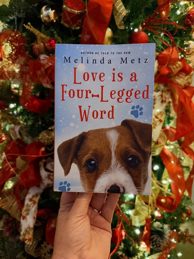 Instagram post by @dana.loves.books for Kensington Books. Caption reads: Love is a Four-Legged Word
Melinda Metz

Published....