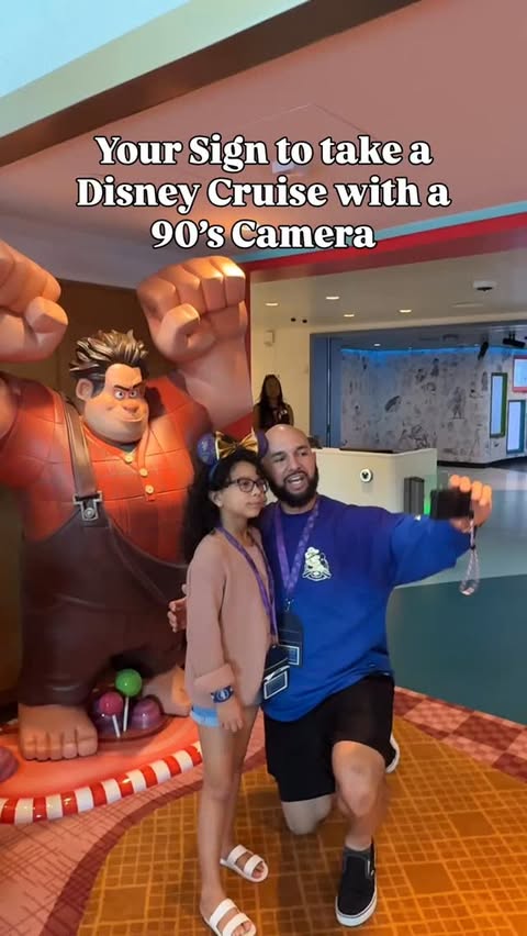Instagram post by @dopedad_e for Disney Parks. Caption reads: My girl loves taking and having her pix taken with....
