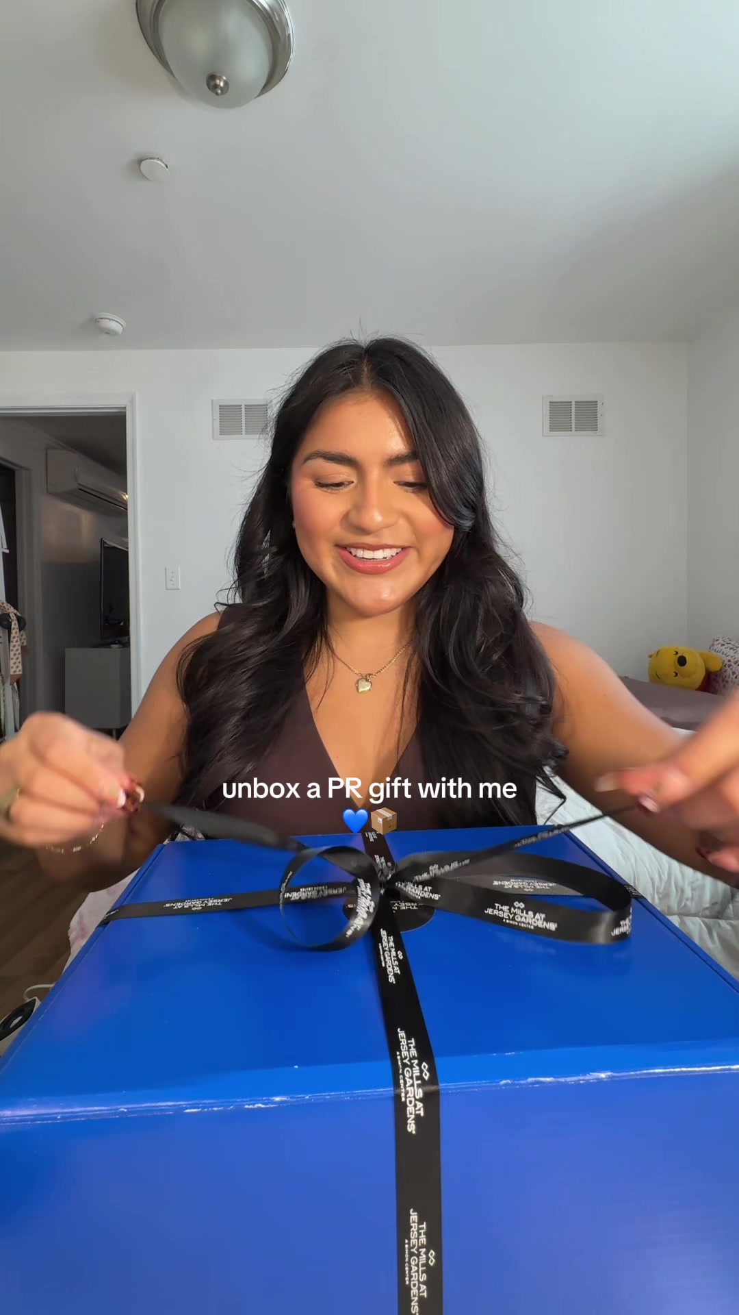 TikTok post by @katfitnlift for The Mall Luxury Outlets. Caption reads: @The Mall Thank you sooo muchhhhh 💙💙💙 #unboxing....