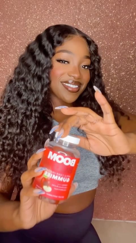 Instagram post by @shaniquejavelle for BOOMBOD. Caption reads: #ad I’m OBSESSED with @boombod ACV gummies 🙌🏽....