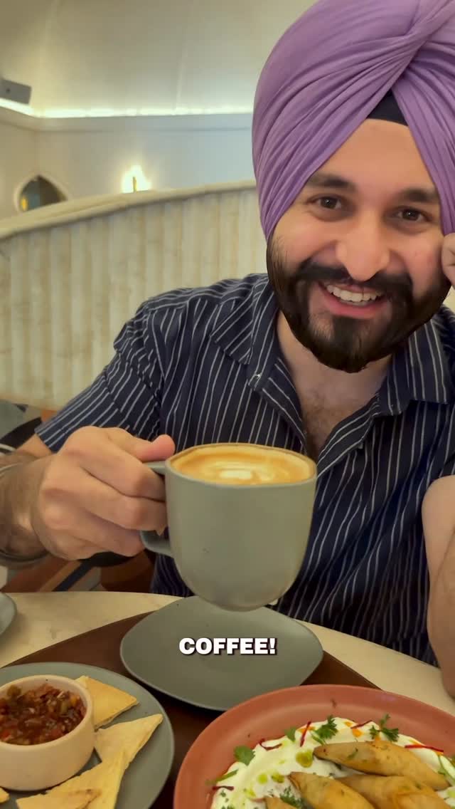 Instagram post by @the_colorful_singh for Tata Motors. Caption reads: Every cup of coffee has a journey – from the misty....