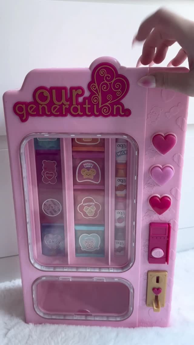 Instagram post by @defintiely for Our Generation Dolls. Caption reads: Let’s restock my mini vending machine 🍫🍭💗....