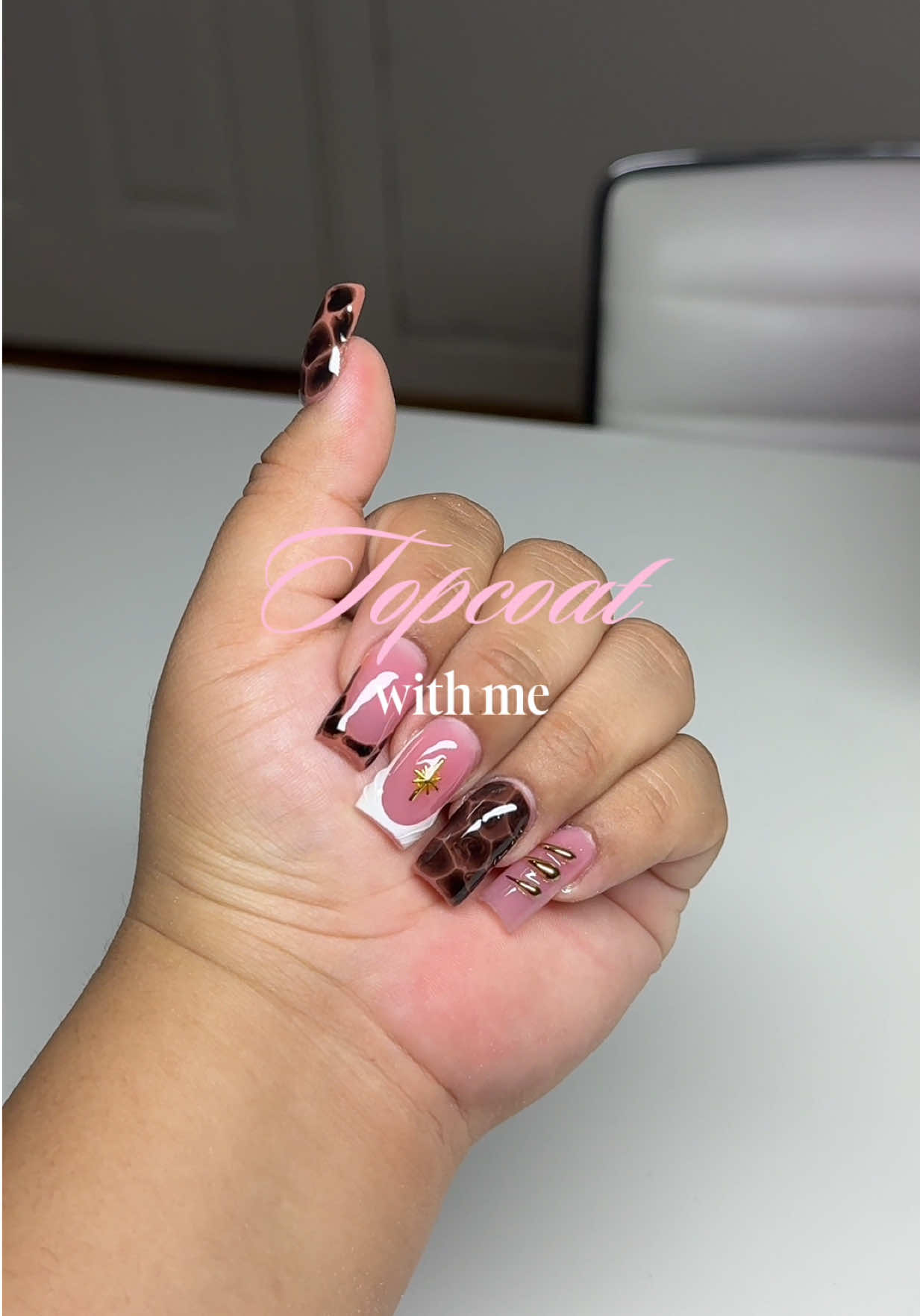 TikTok post by @silvia_.sanchez for GAOY. Caption reads: my fav topcoat💖@gaoy_official #acrylicnails....