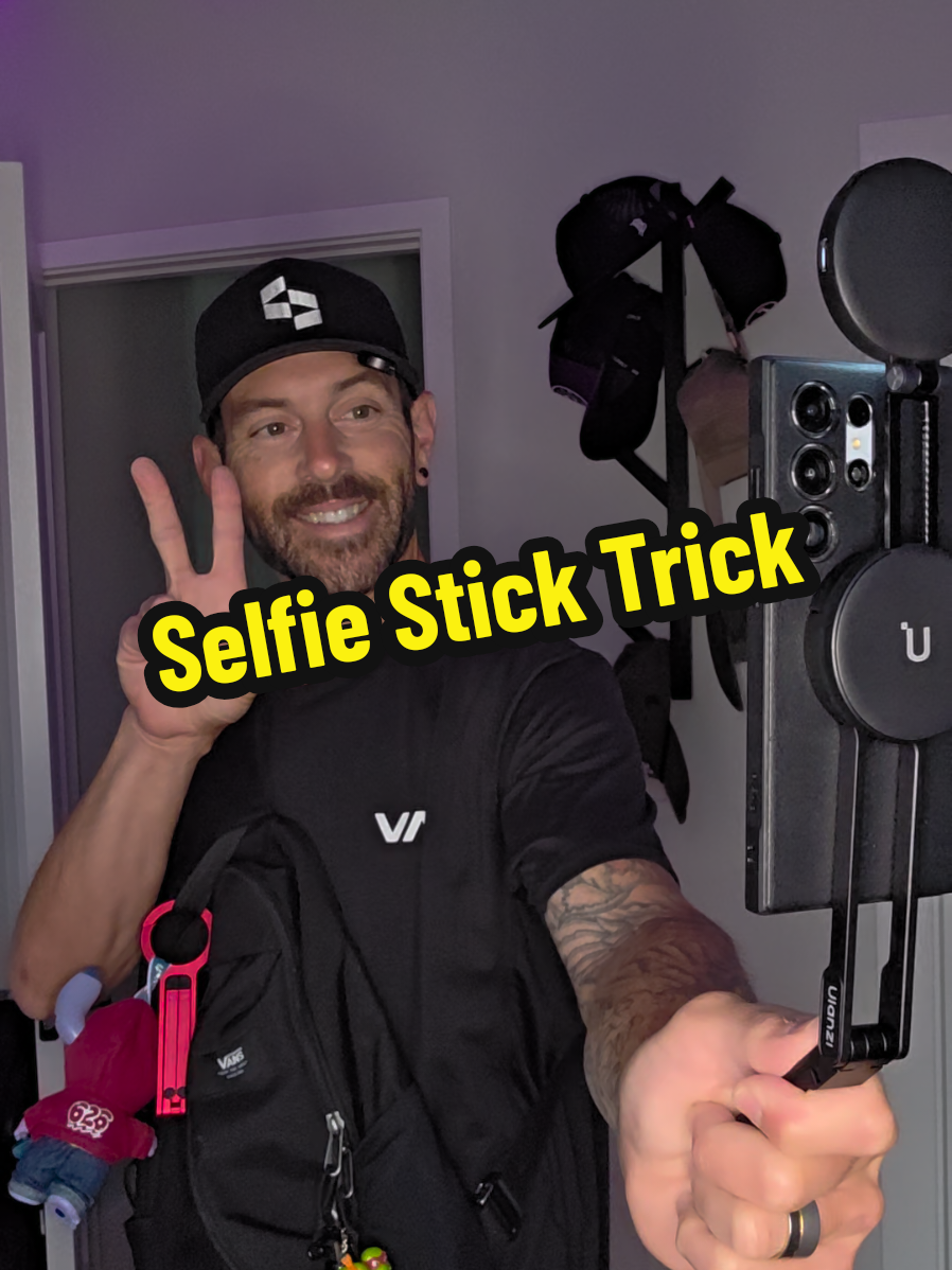 TikTok post by @theghousefam for Ulanzi. Caption reads: [...] little selfie stick trick 😉 #ulanzi....