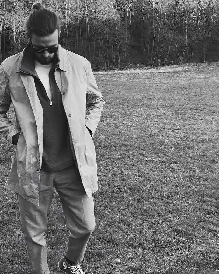 Instagram post by @daniel.reith for SANVT. Caption reads: Sunday walk ▫️▪️#ad
#fashion #bw #cos....