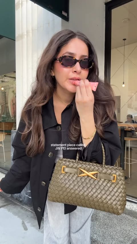 Instagram post by @ariananrmz for JW PEI. Caption reads: Olive accent, effortlessly chic 🤎🫒....