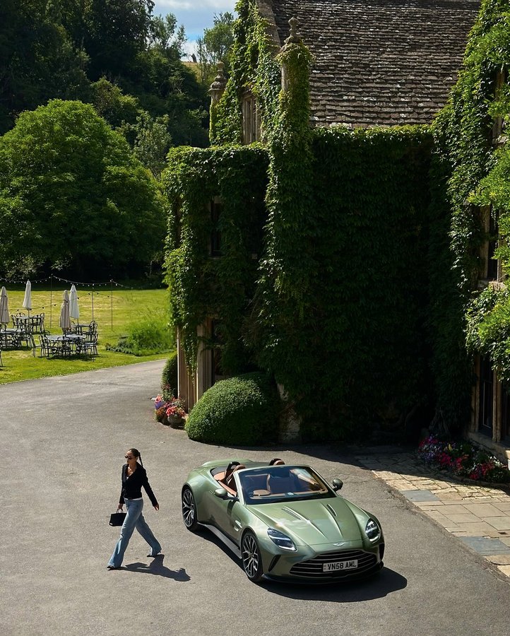 Instagram post by an influencer for Aston Martin. Caption reads: 60 years of Volante. @astonmartin British....