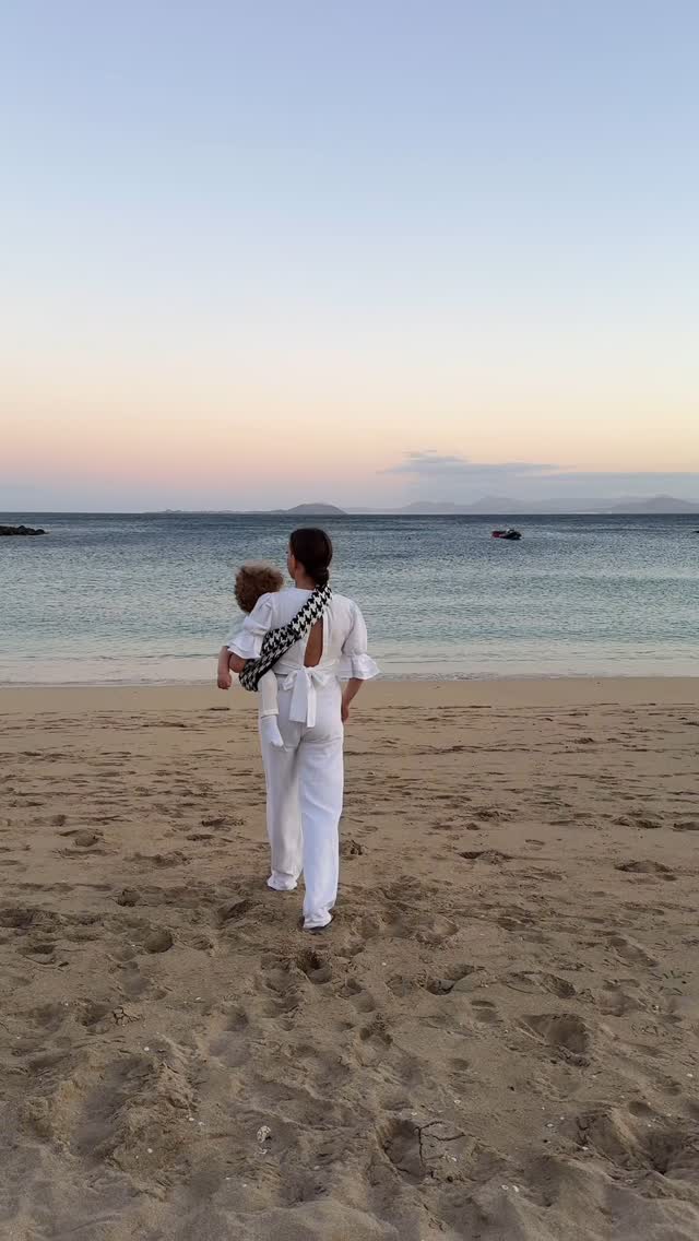 Instagram post by @dianaerisir for WILDRIDE. Caption reads: AD* By the ocean, in my arms — @wildride_official....