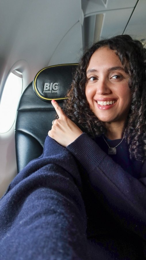 Instagram post by @dominicanabroad for Spirit Airlines. Caption reads: On top of ALL of that? No change fees. No....