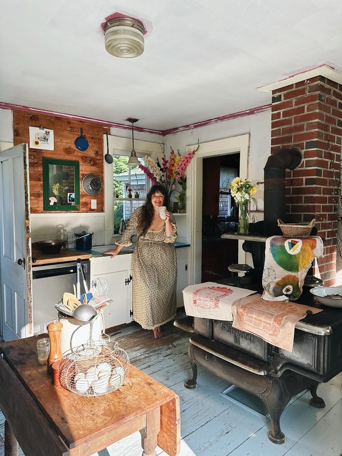 Instagram post by @homesweethomestead for Christy Dawn. Caption reads: a woman, happy, in her little kitchen, on the....