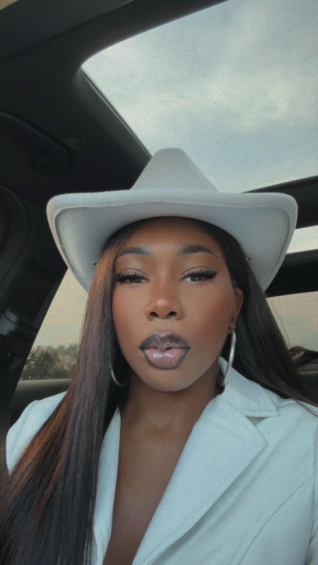 Instagram post by @thetaylorpatrice for Citi Trends. Caption reads: outfit check ✅ | Red Plaid Shorts Outfit ft.....