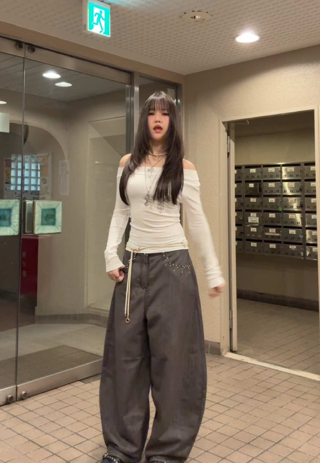 TikTok post by @kitsue__ for LEWKIN. Caption reads: obsessed w the jeans sm @Lewkin <3 use my code....