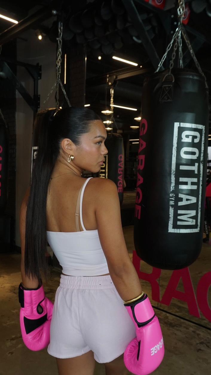 Instagram post by @nicoledelosreyes_ for Garage Clothing. Caption reads: cute outfit? im there🥊🤝🏽🫡 @garageclothing....