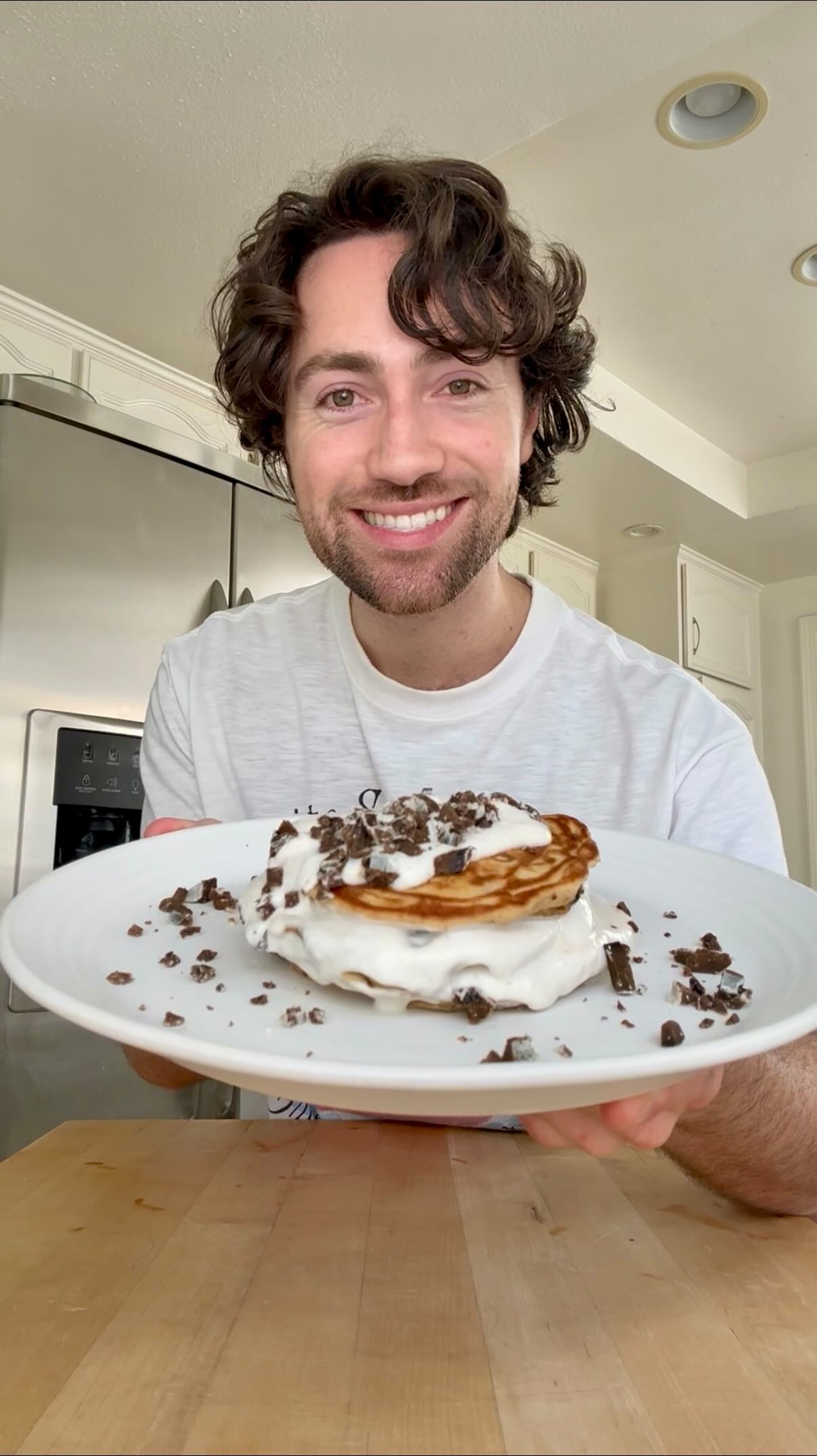 Instagram post by @justincooksgood for No Cow. Caption reads: Cookies & Cream Pancakes using @nocow protein....