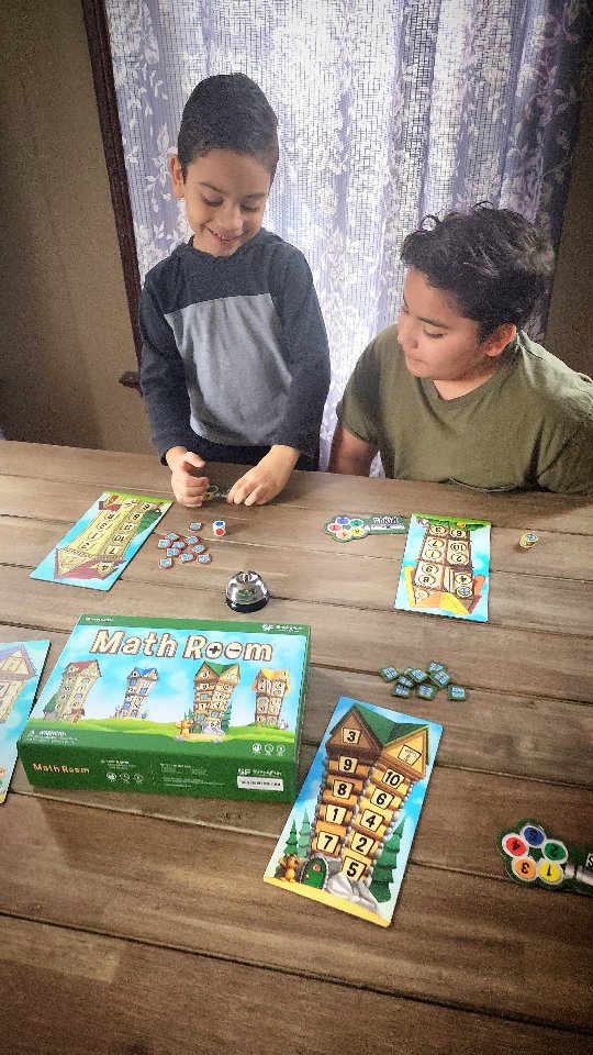 Instagram post by @wickedcoolkidz for SimplyFun. Caption reads: [...] #marchmathness playing Math Room by....