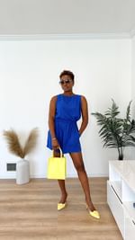 Instagram post by @simplygailg for TIJN Eyewear. Caption reads: Styling these gorgeous @larroude mules. I always....