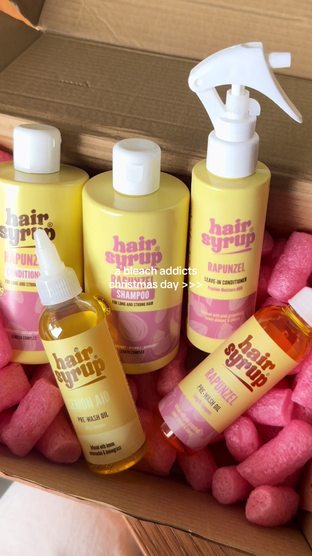 TikTok post by @nellytrue_ for Hair Syrup. Caption reads: Delivery for some extreme TLC💆🏼‍♀️ @hairsyrup....