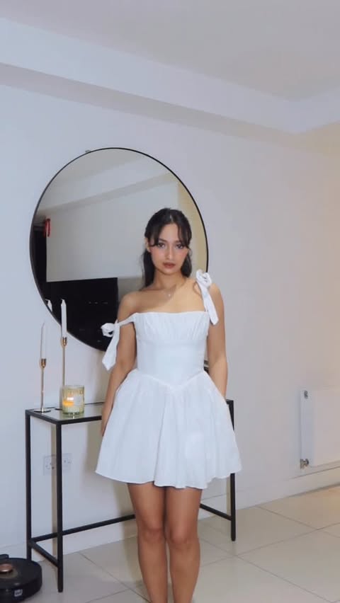 Instagram post by @nines_chi for OH POLLY. Caption reads: This dress is so cute 😍

From @ohpolly.