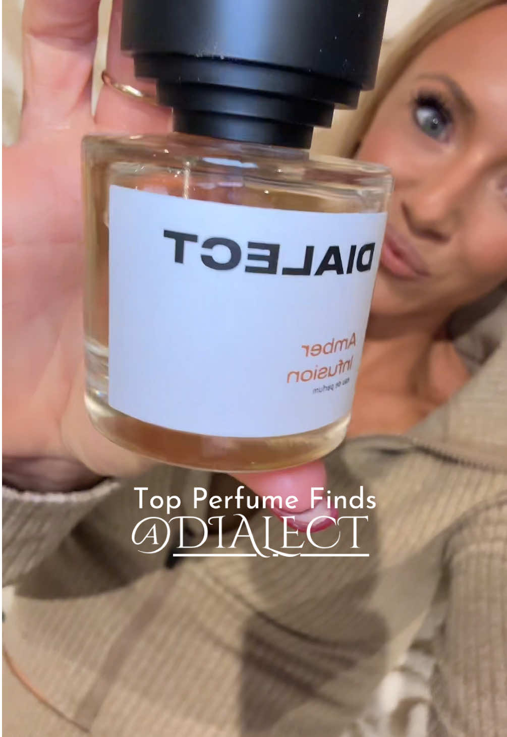 TikTok post by @ashleighavery for Dialect Södertälje. Caption reads: Top Perfume Finds @DIALECT #perfumefinds....