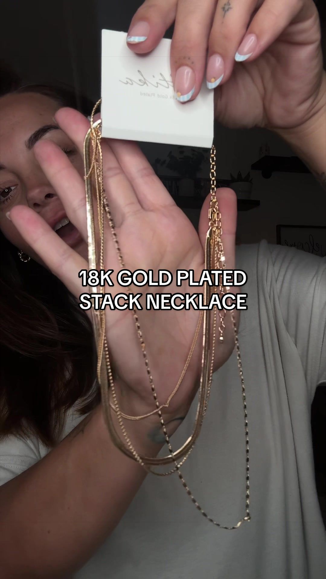 TikTok post by @courtney.hollidayy for Ettika. Caption reads: [...] perfect #goldplatedjewelry stack from....