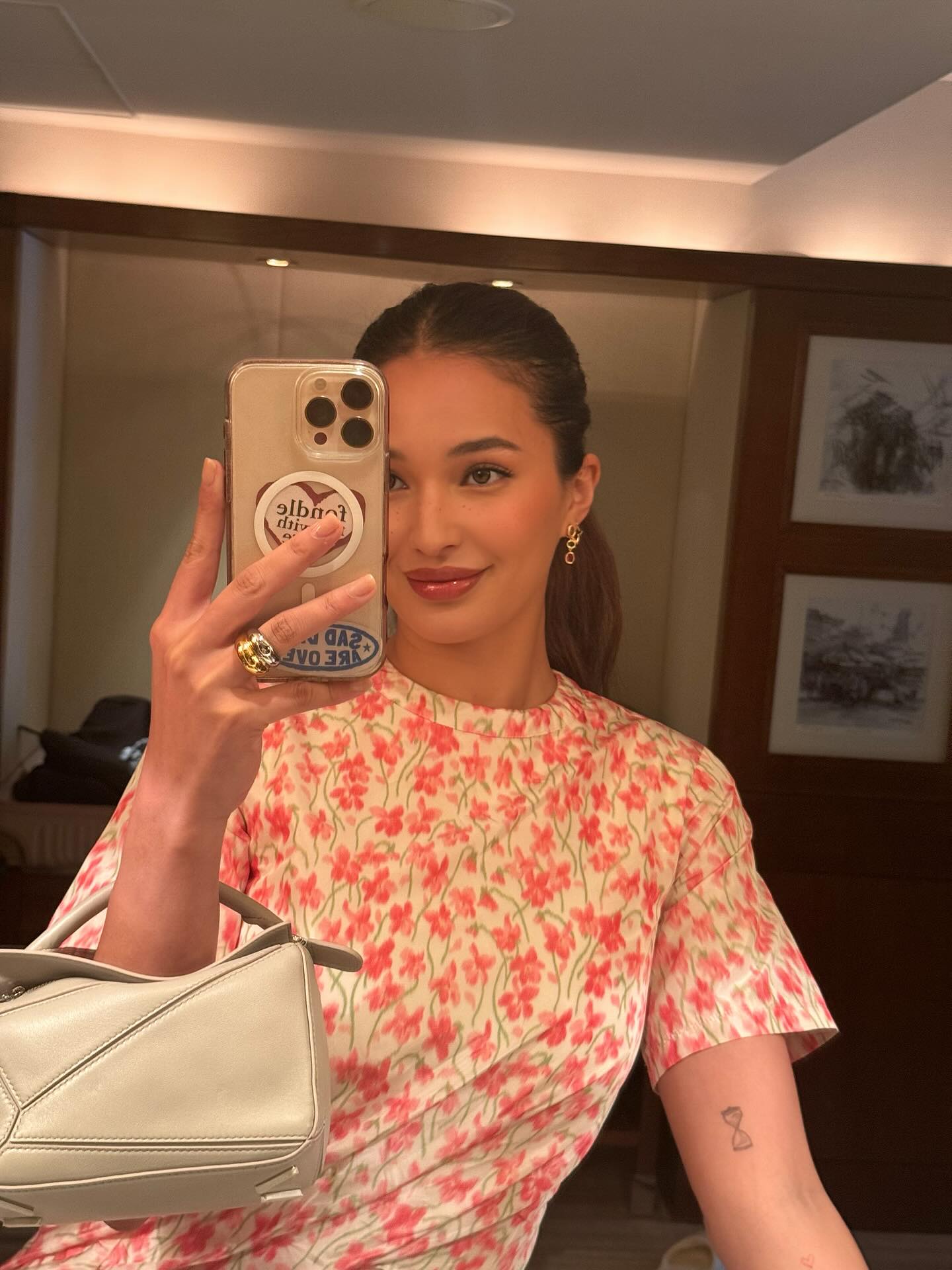 Instagram post by @sarahlahbati for LOEWE. Caption reads: celebrated the 10th anniversary of @loewe’s iconic....