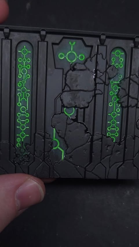 Instagram post by @thepaintingcoach for AK-Interactive. Caption reads: [...] how to do a simple green glow using....