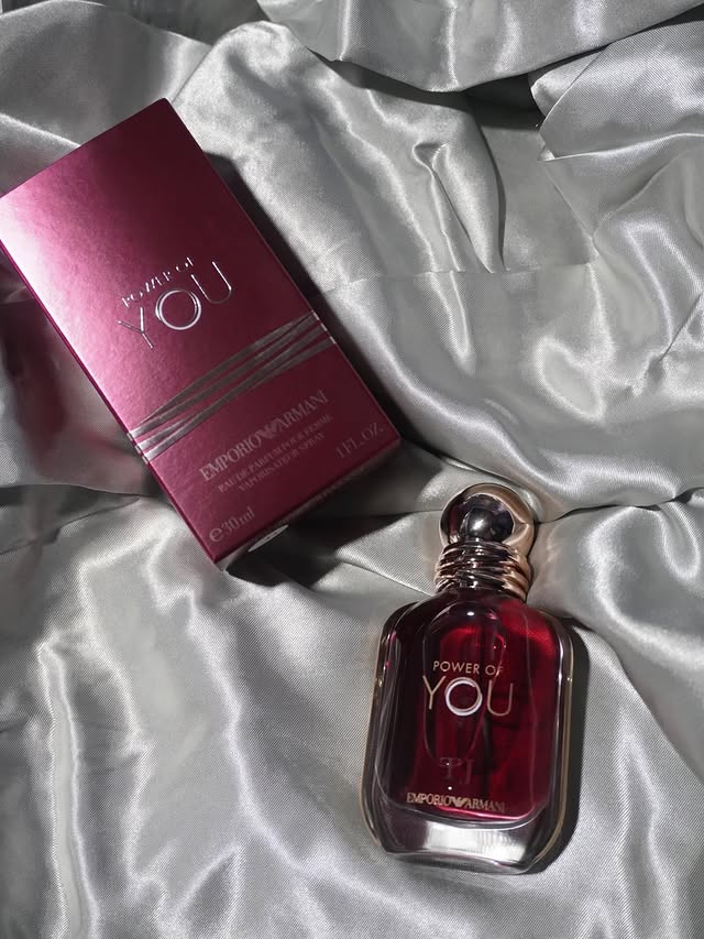 Instagram post by @ttakk__o for Emporio Armani. Caption reads: @emporioarmani 🤭💘 #collab #giftideas #womangift....